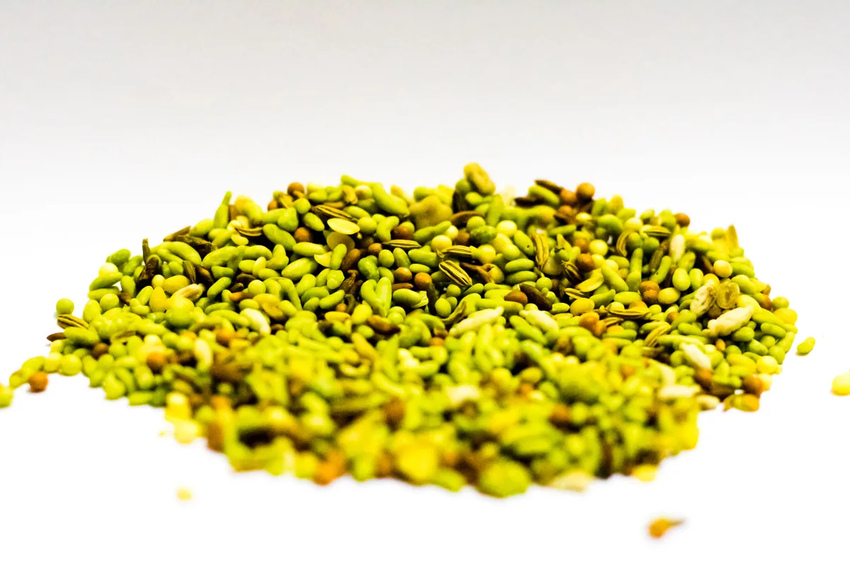 A pile of candy-coated fennel seeds and other seeds, the mix served after meals in Indian restaurants